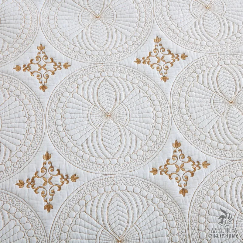 European-style pure cotton embroidered bed cover set with two pillowcases on a bed