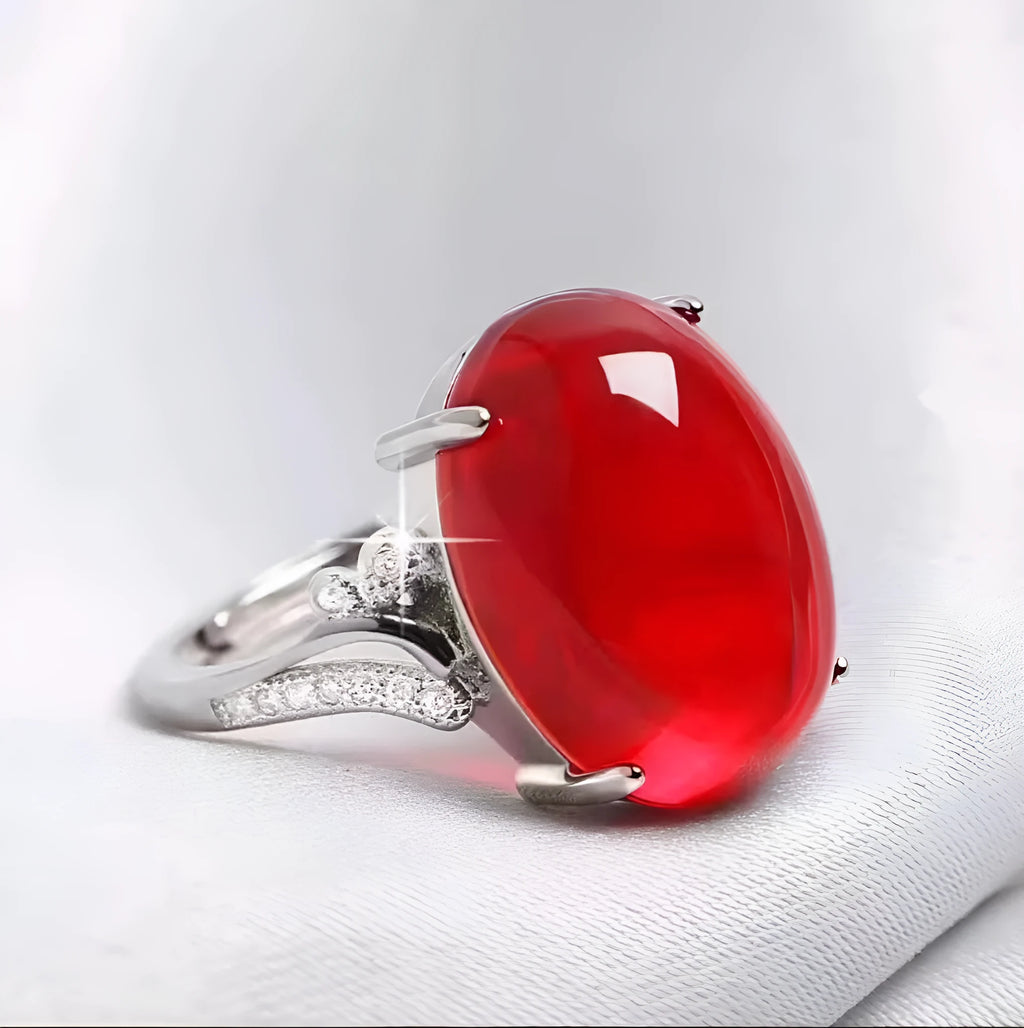 Adjustable geometric ethnic-style alloy ring with a natural sapphire, shown in multiple colour options.