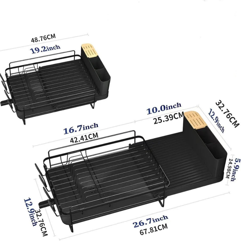 Foldable carbon steel dish drain rack holding cutlery and cups on a kitchen counter.