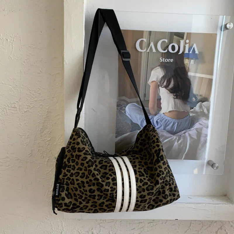 Leopard print sports messenger crossbody bag with large capacity and cloth construction