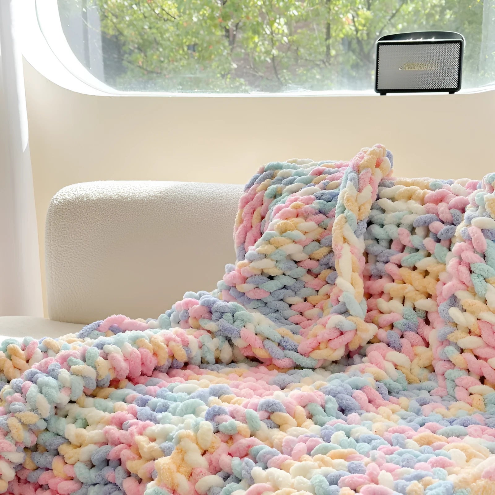 Thick striped chenille blanket in a choice of four colours, shown laid flat displaying its 130x170cm size.