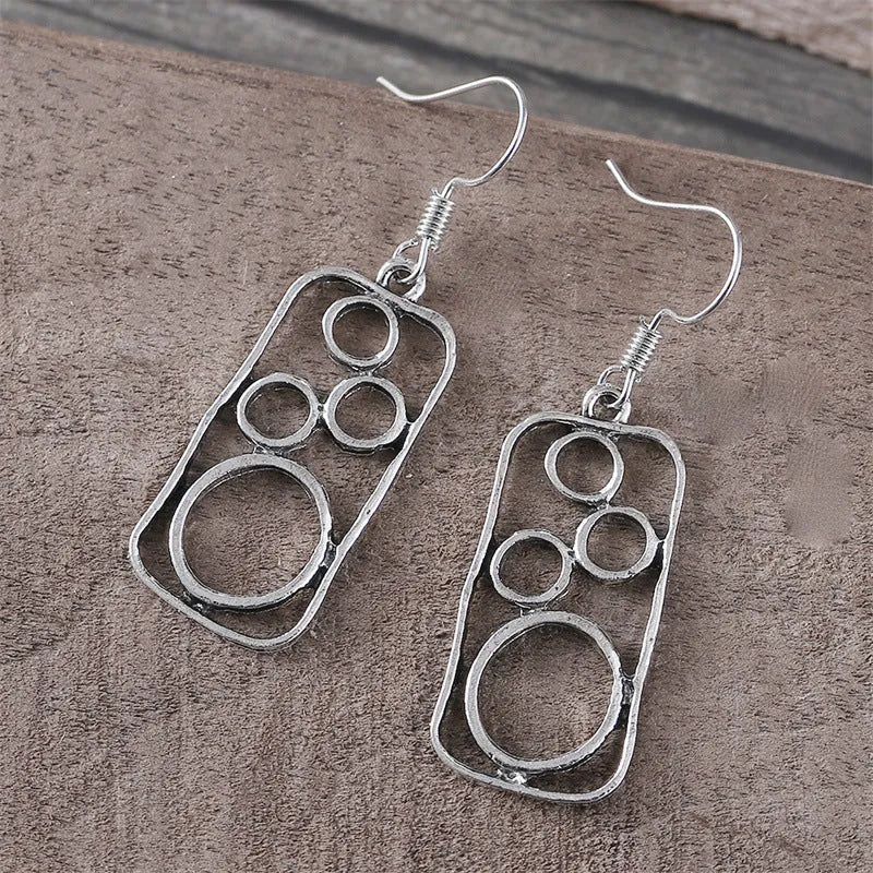 Geometric earrings with irregular square and round design in antique silver colour