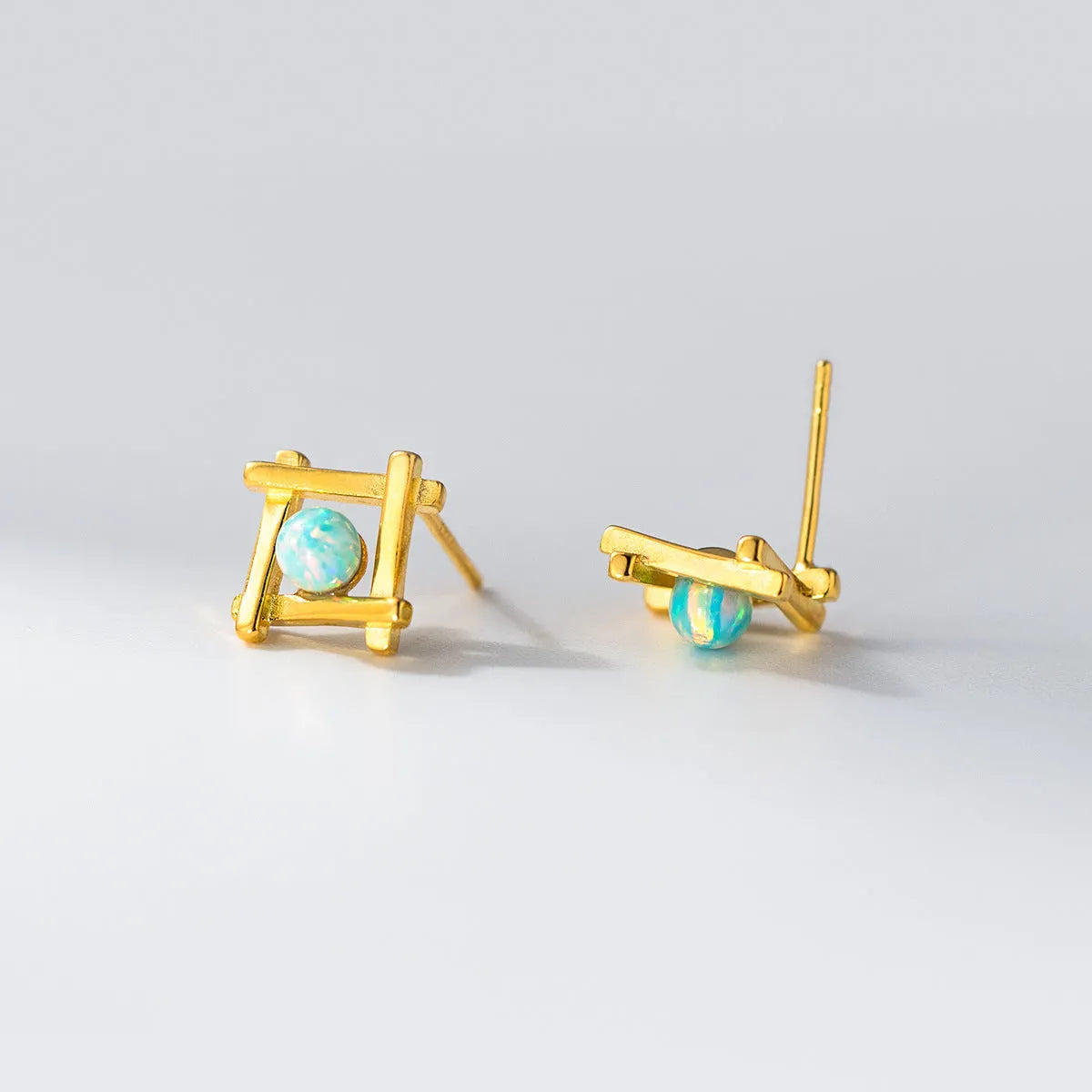 Geometric cross quadrangle stud earrings in 925 silver with silver and gold tone options