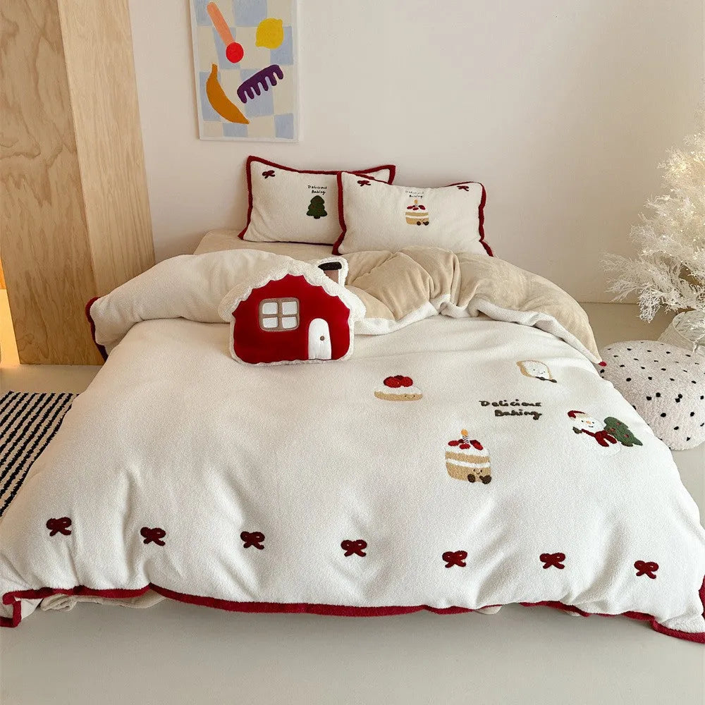 Winter Christmas cartoon bedding four-piece set with snowman and heart pattern on duvet cover and pillowcases.