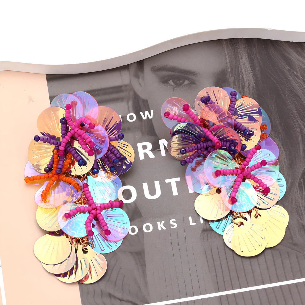 Handmade beaded flower earrings with floral and leaf designs in colourful, rose or purple colours