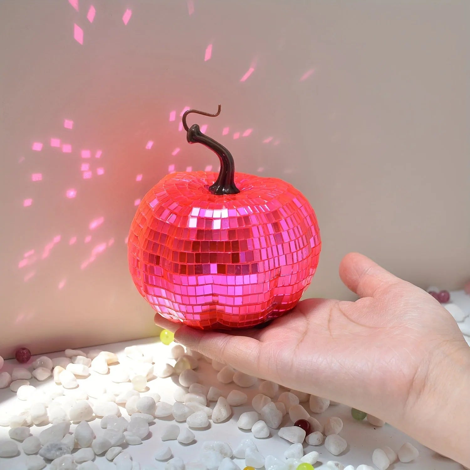 A Chinese-style glass pumpkin ornament with a mirror finish, shown in one of five available sizes.