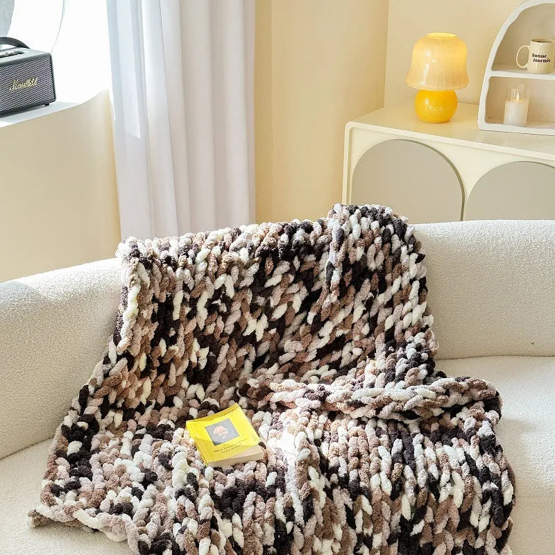 Thick striped chenille blanket in a choice of four colours, shown laid flat displaying its 130x170cm size.