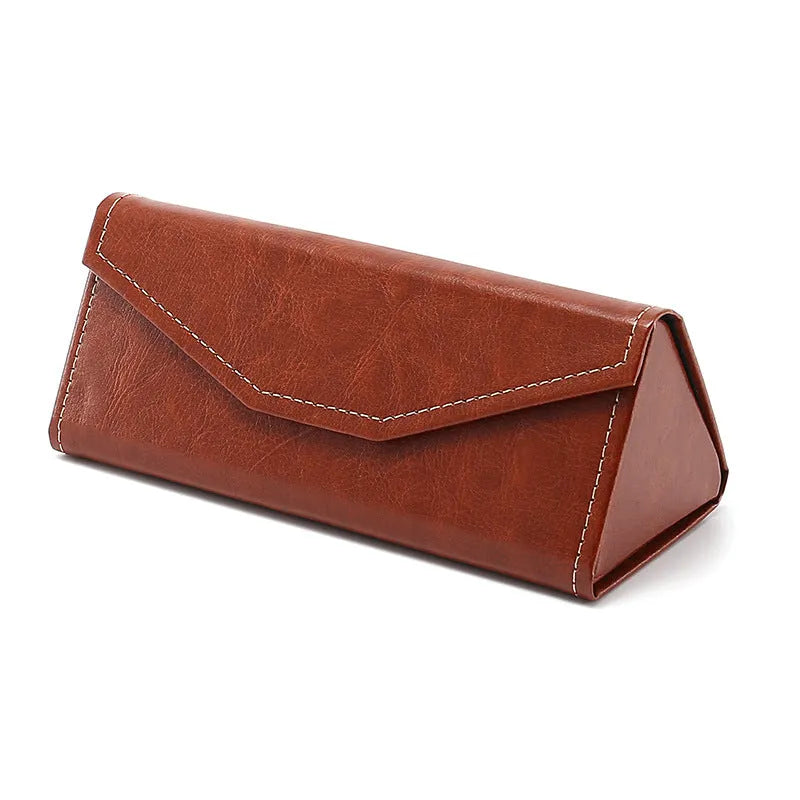 Black triangle folding glasses case with handmade stitching on PU cowhide exterior