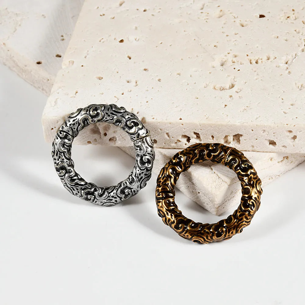 Stainless steel fashion earrings with totem patterning in multiple colour options