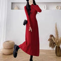Women's knitted high waist A-line skirt dress in a solid colour, mid-length below the knees