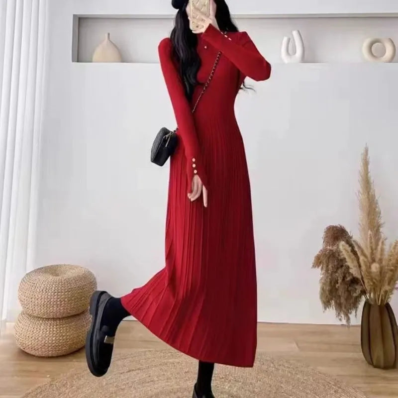 Women's knitted high waist A-line skirt dress in a solid colour, mid-length below the knees