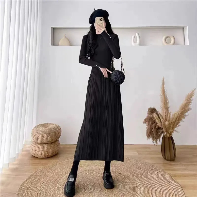Women's knitted high waist A-line skirt dress in a solid colour, mid-length below the knees