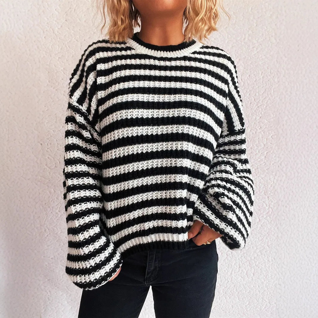 Women's striped loose pullover sweater in polyester knit with round neck and long sleeves