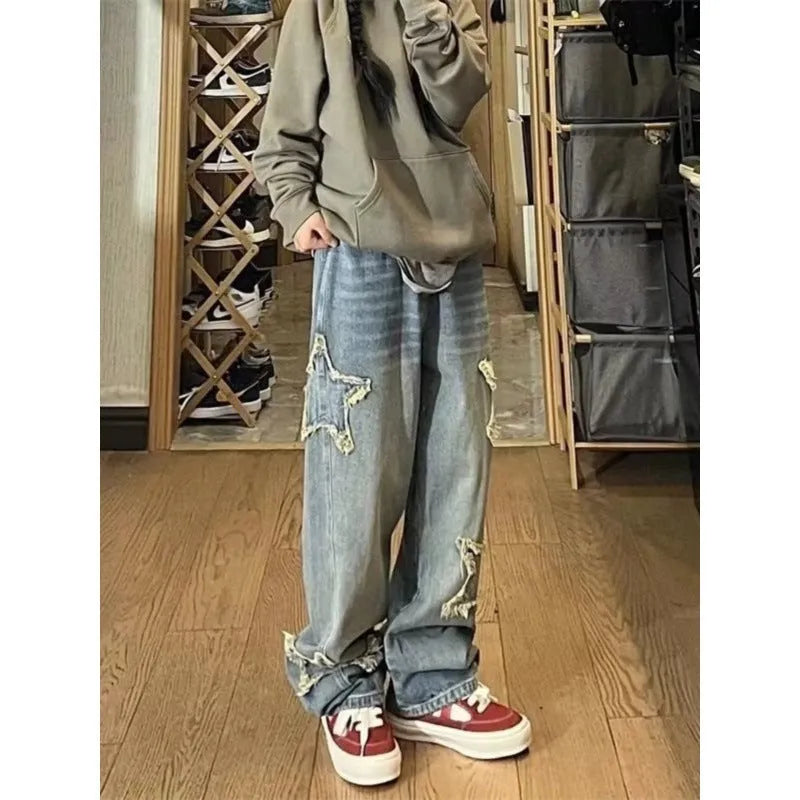 Blue high-waist straight-leg women's jeans on a neutral background