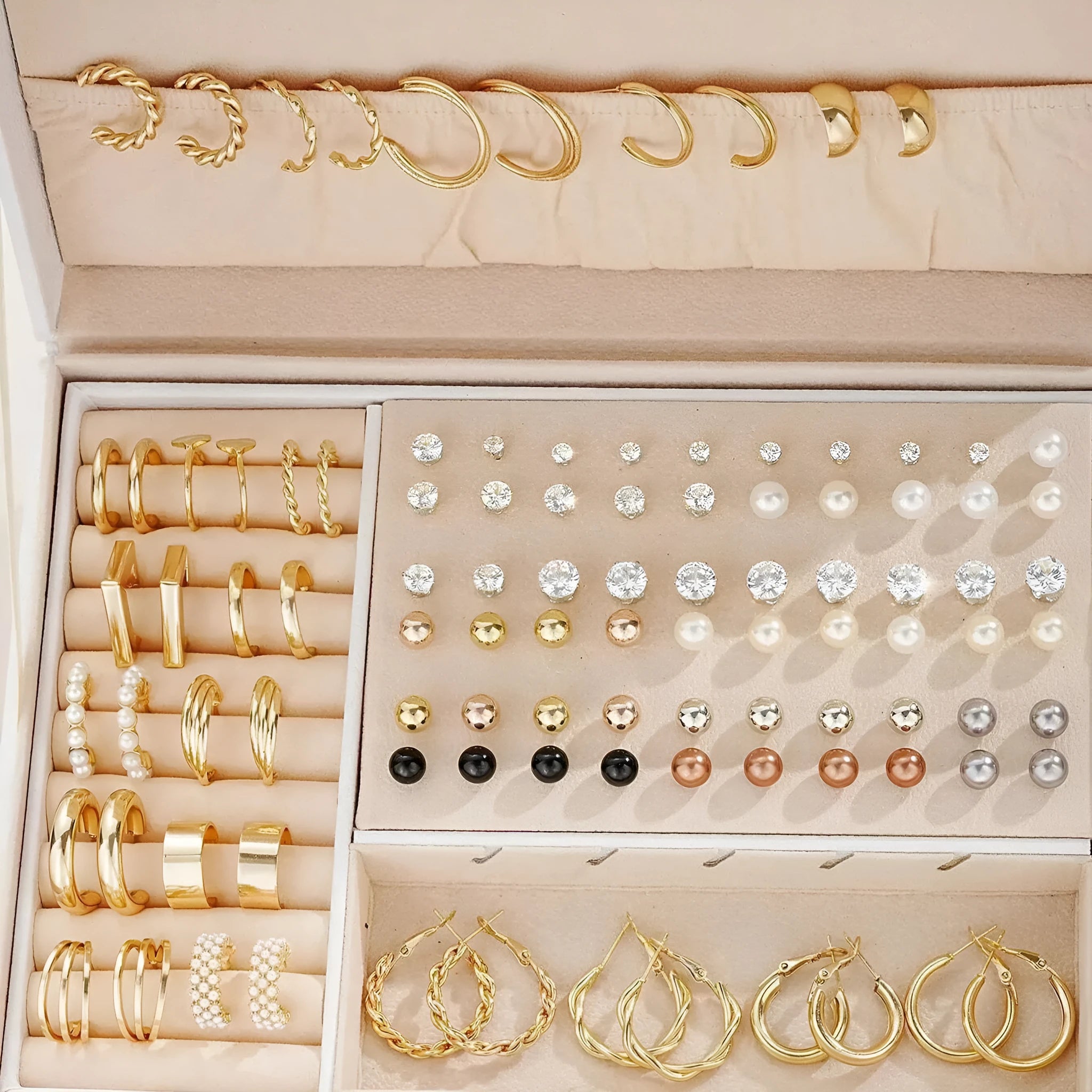108 geometric alloy earrings with electroplated gold and yellow finishes showing round design elements