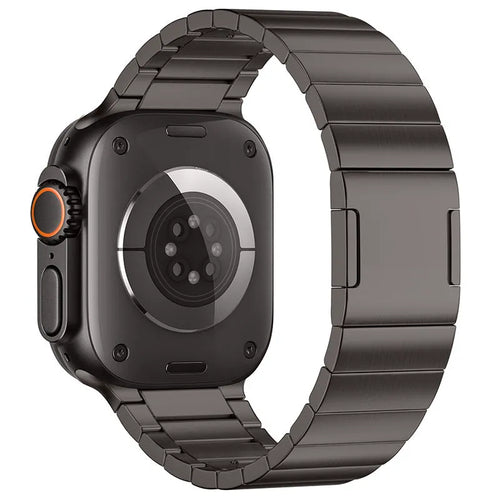 Stainless steel Apple Watch strap with magnetic buckle in business style.