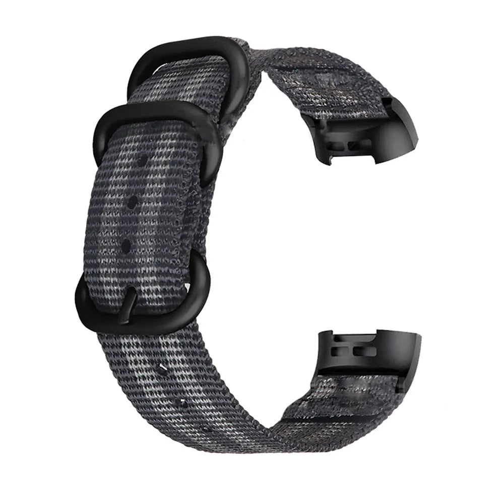 Nylon three-ring buckle replacement strap for Fitbit Charge fitness trackers in multiple colours.