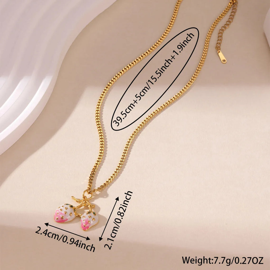 Stainless steel strawberry fruit pendant necklace on an alloy chain, shown in red and white gradient colour options.