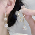 Silver drop earrings with tassel balls and rhinestones on confession balloon double pendant design
