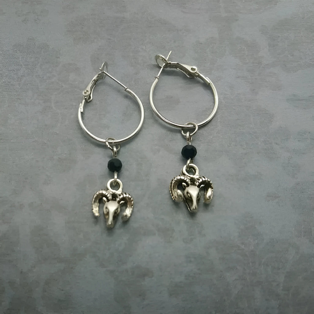 Silver round ring earrings with Tibetan antelope design and alloy construction
