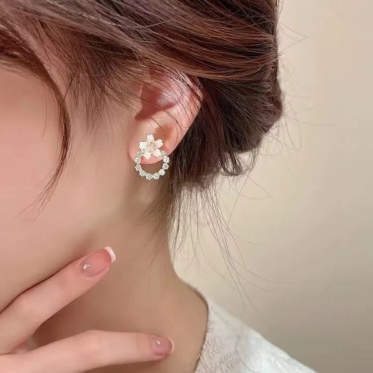 Fashion dripping oil peach blossom stud earrings for women in alloy with electroplated finish