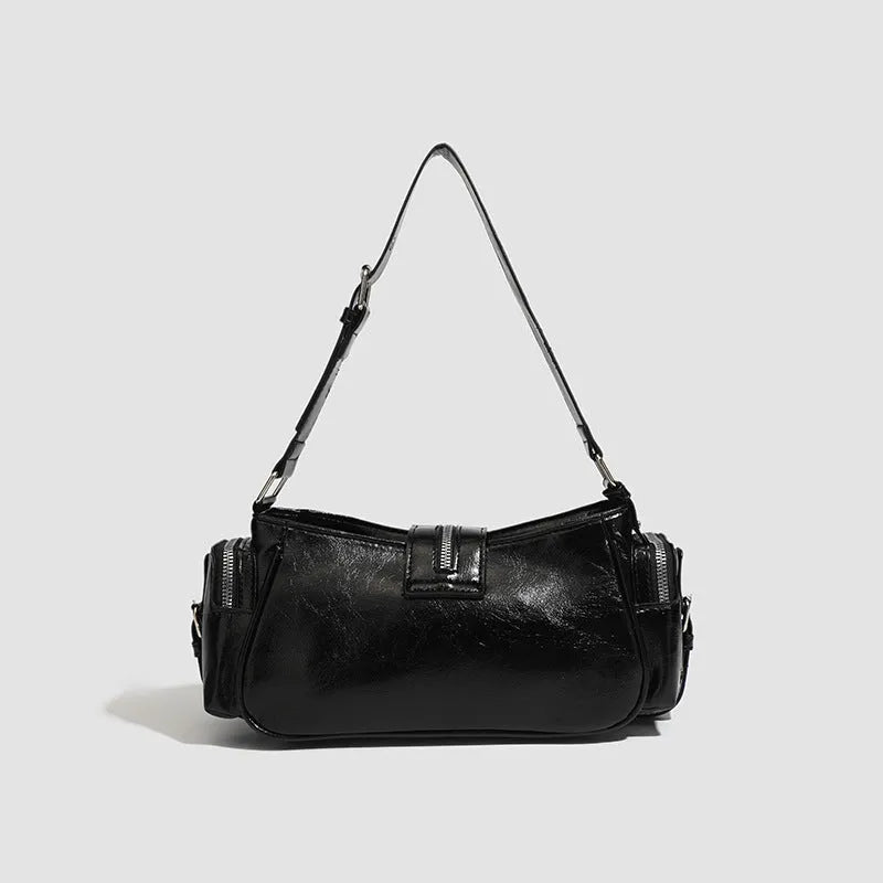 Black dumpling-shaped retro handbag with oil wax leather and three-dimensional pocket design