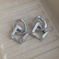 Geometric circle pendant earrings with gold electroplated finish showing 3.4 cm height measurement