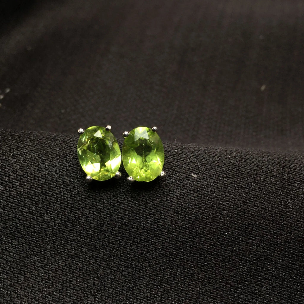 Natural grass green olivine stud earrings in S925 sterling silver with 6x8mm oval stone