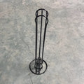 Wrought iron coffee capsule storage rack holding multiple pods with spray black finish