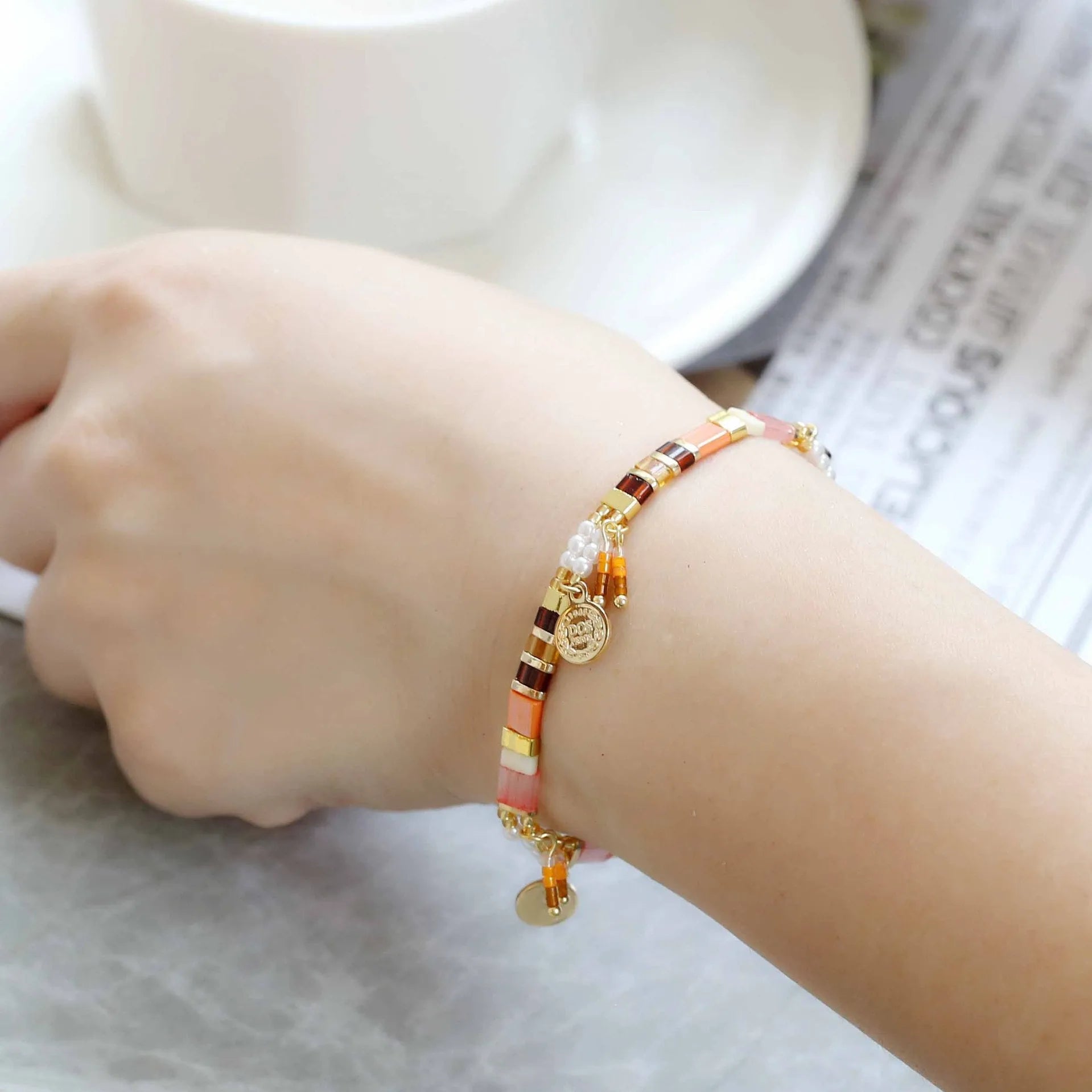 Women's handmade imitation pearl beaded bracelet in European/American style with glass coloured beads