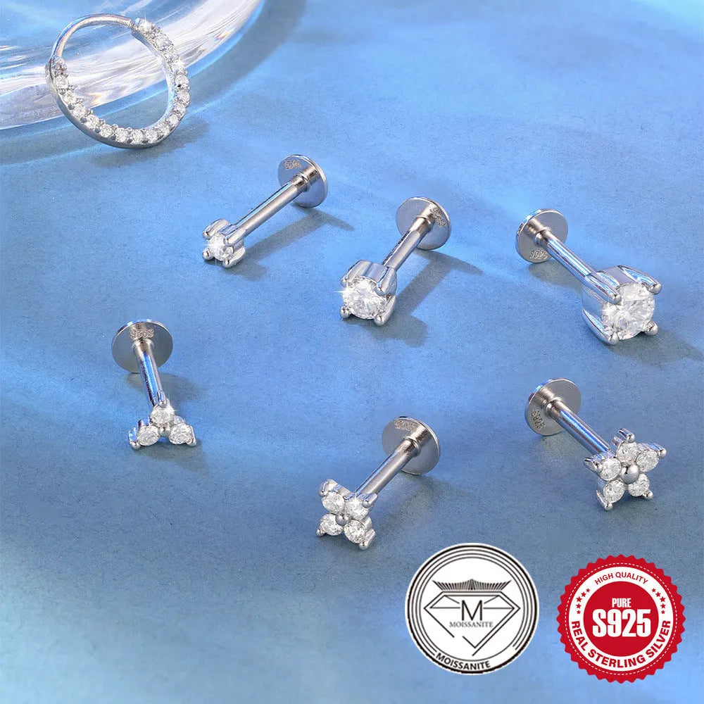 A pair of S925 sterling silver geometric petal stud earrings with a platinum finish, shown in a clip-on style.