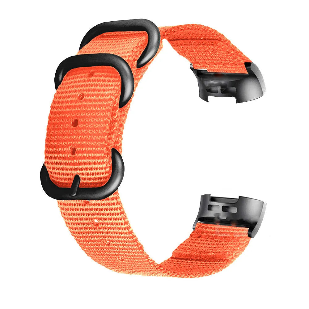 Nylon three-ring buckle replacement strap for Fitbit Charge fitness trackers in multiple colours.