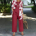 Women's blue three-piece casual suit comprising a long-sleeve coat, a vest, and trousers on a hanger.