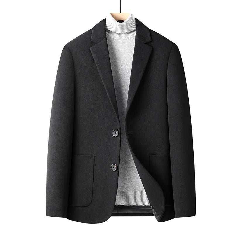 Men's slim fit wool suit jacket in grey shown on a model, suitable for autumn and winter wear.