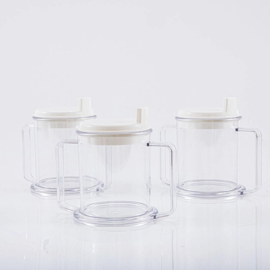 Transparent lightweight plastic drinking cup with spill-proof design on a plain background