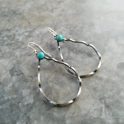 Bohemian style geometric circle earrings with antique silver finish and turquoise accent