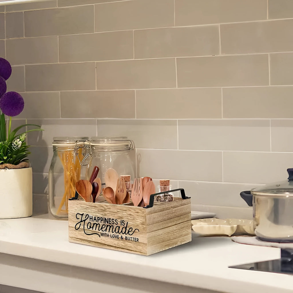 Modern minimalist wooden box with grid dividers for organising kitchen utensils.