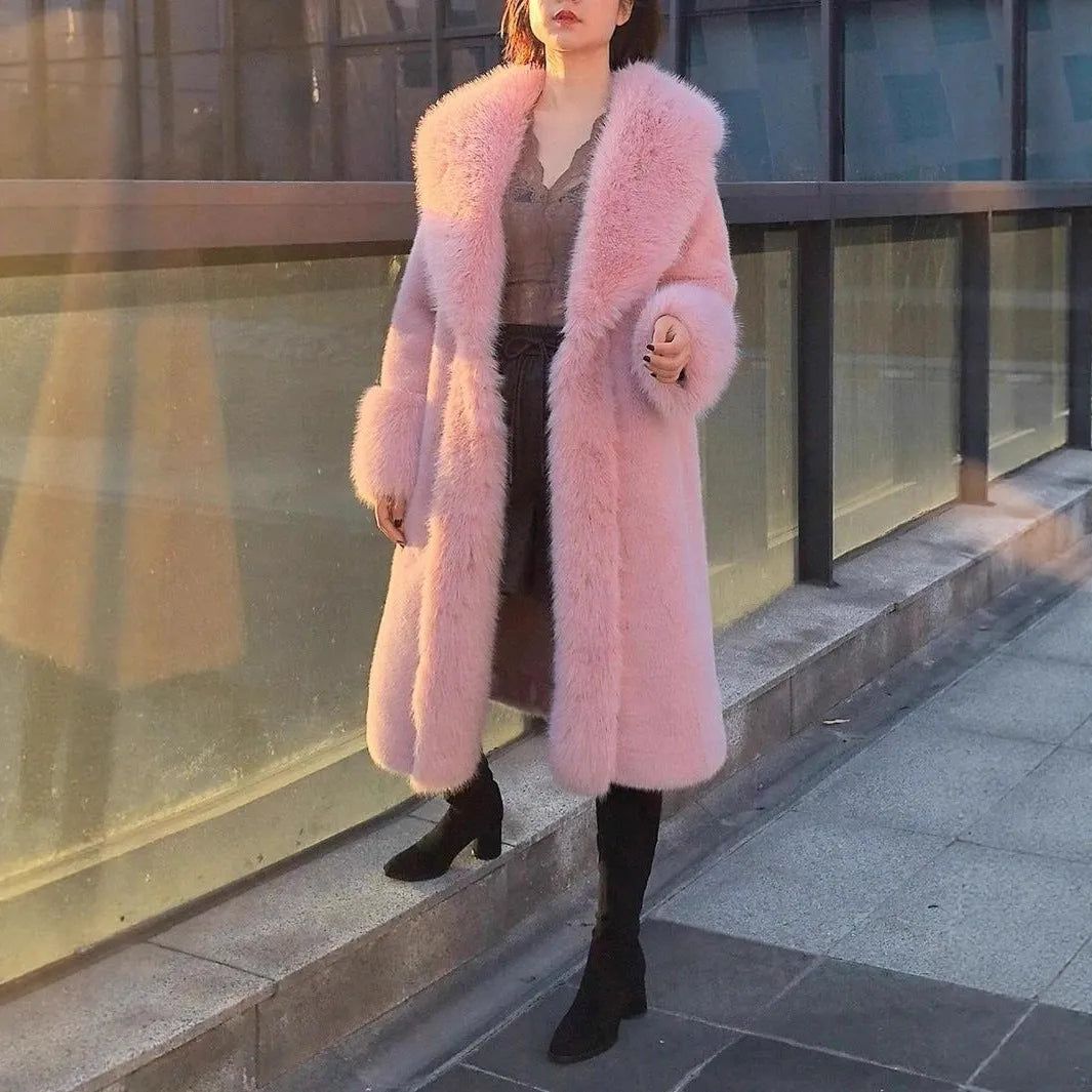 Women's grey thick faux rabbit fur mid-length coat with a fur collar on a hanger.