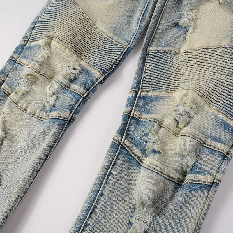 Light blue distressed slim fit men's jeans with hand-frayed detailing and stretch denim fabric