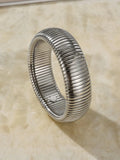 Women's titanium steel bracelet with vertical stripe pattern in gold or silver finish