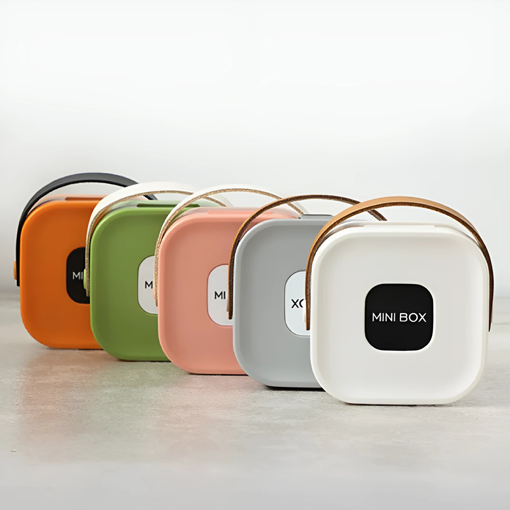 Medium polypropylene cable storage box with lid in five colour options for organising data cables and headphones