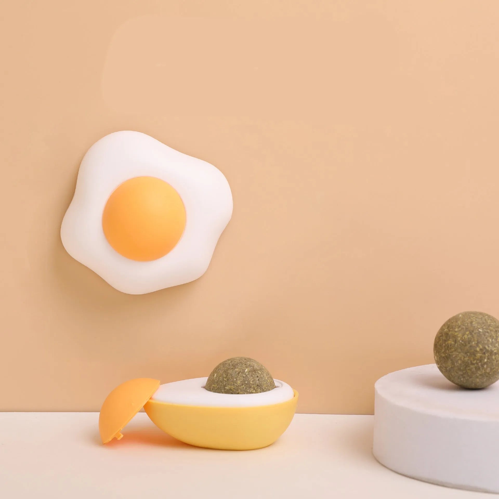 Soft plush catnip ball toy in fried egg shape for wall play with cats