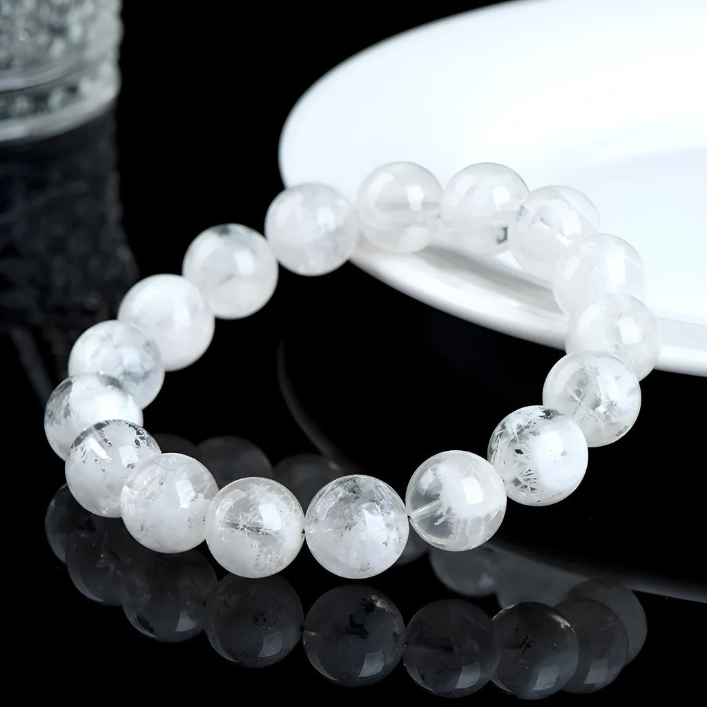 Women's crystal bracelet with natural blizzard snowflake round beads featuring Ruyi and Xiangyun traditional design elements