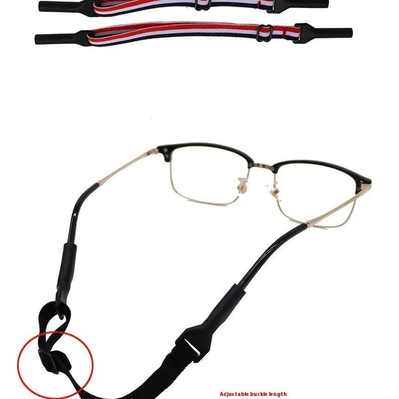 Black adjustable glasses cord with silicone earpiece ends on eyewear