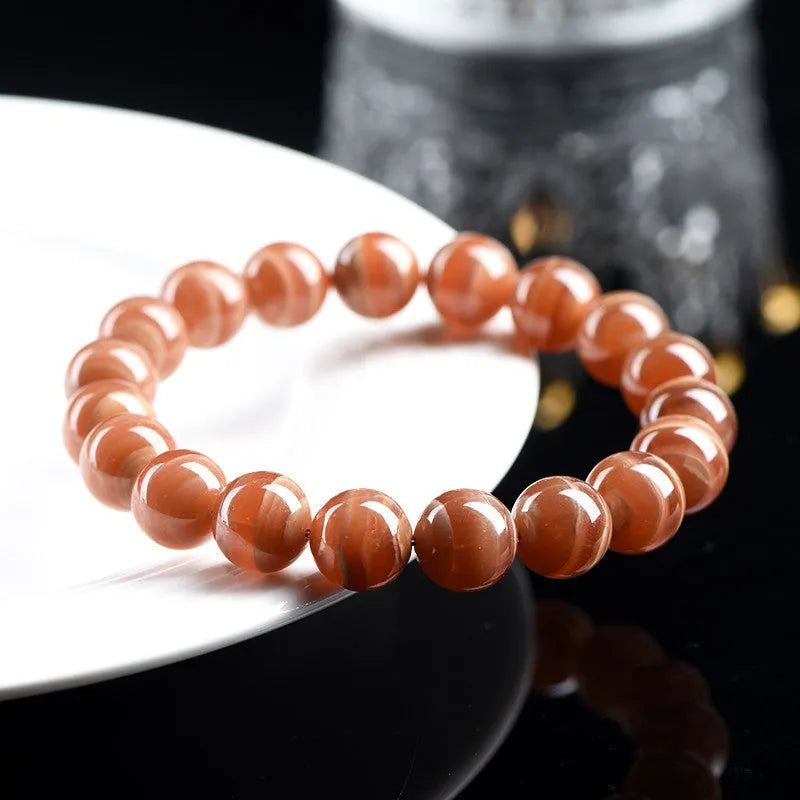 Natural Old Mine Rhodochrosite round bead bracelet with Ruyi elements in 6mm or 8mm bead options
