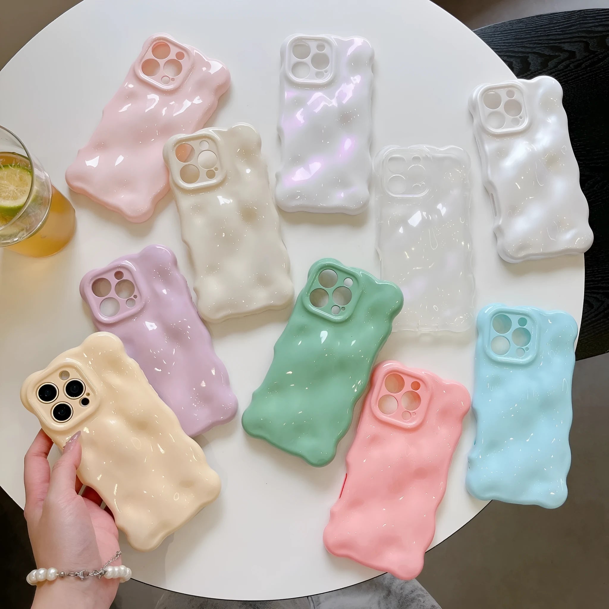 Solid colour wave shell TPU phone case in cream yellow for iPhone 14 Pro