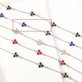 Women's stainless steel geometric bracelet with triangle design and three-diamond centrepiece in gold or steel finish.