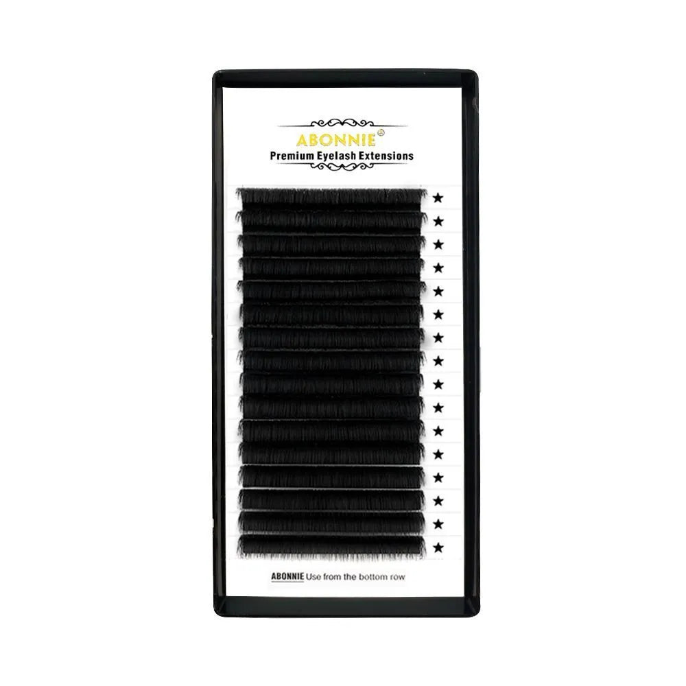 Pair of dense 16-row false eyelashes made from matte wool mink hair, showing voluminous length.