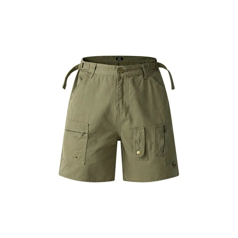 Retro loose-fit washed cotton workwear shorts for men and women in camouflage colour with a zipper fly.