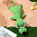 Colourful plush dog toy in animal shape with corn kernel texture and squeaker.